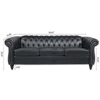 84.65 Divano Chesterfield in finta pelle trapuntata con braccioli arrotolati