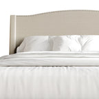 Letto imbottito Wingback con borchie cromate e cassetti contenitore