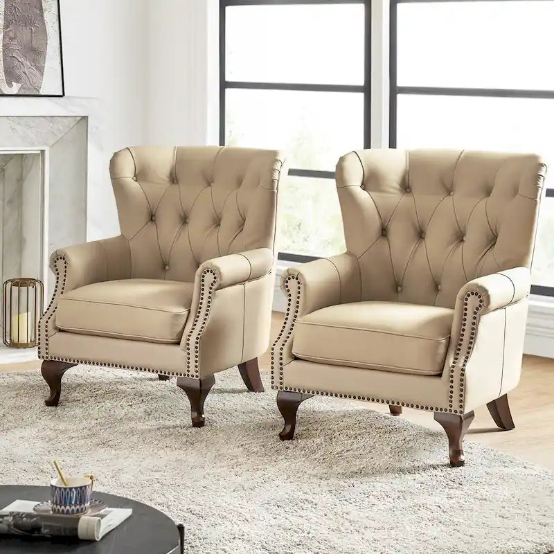 Poltrona in vera pelle con finiture borchiate e set di 2 cuscini sfoderabili